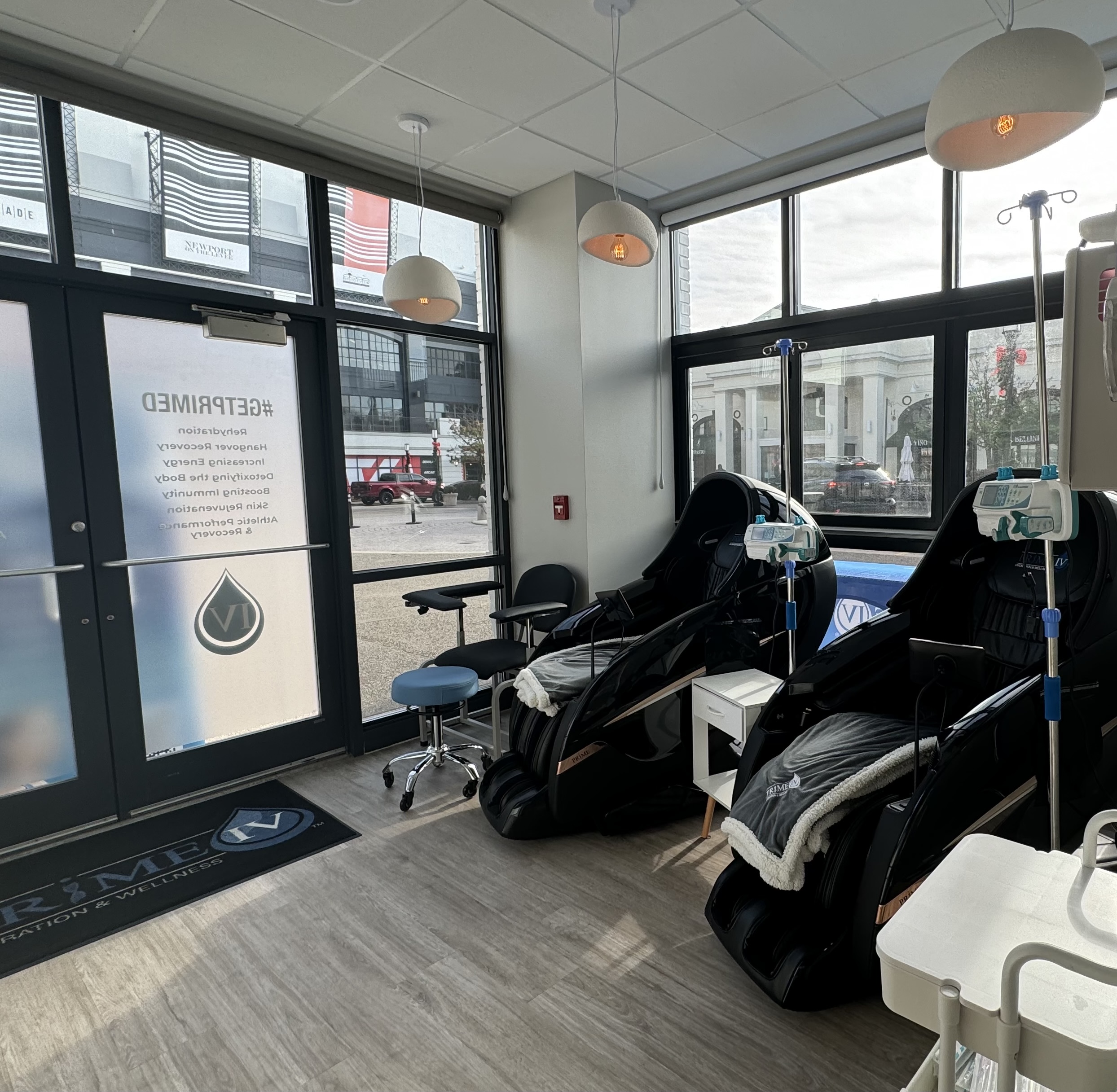 Inside Prime IV Hydration Newport — comfortable massage recliner lounge chairs in a modern wellness clinic
