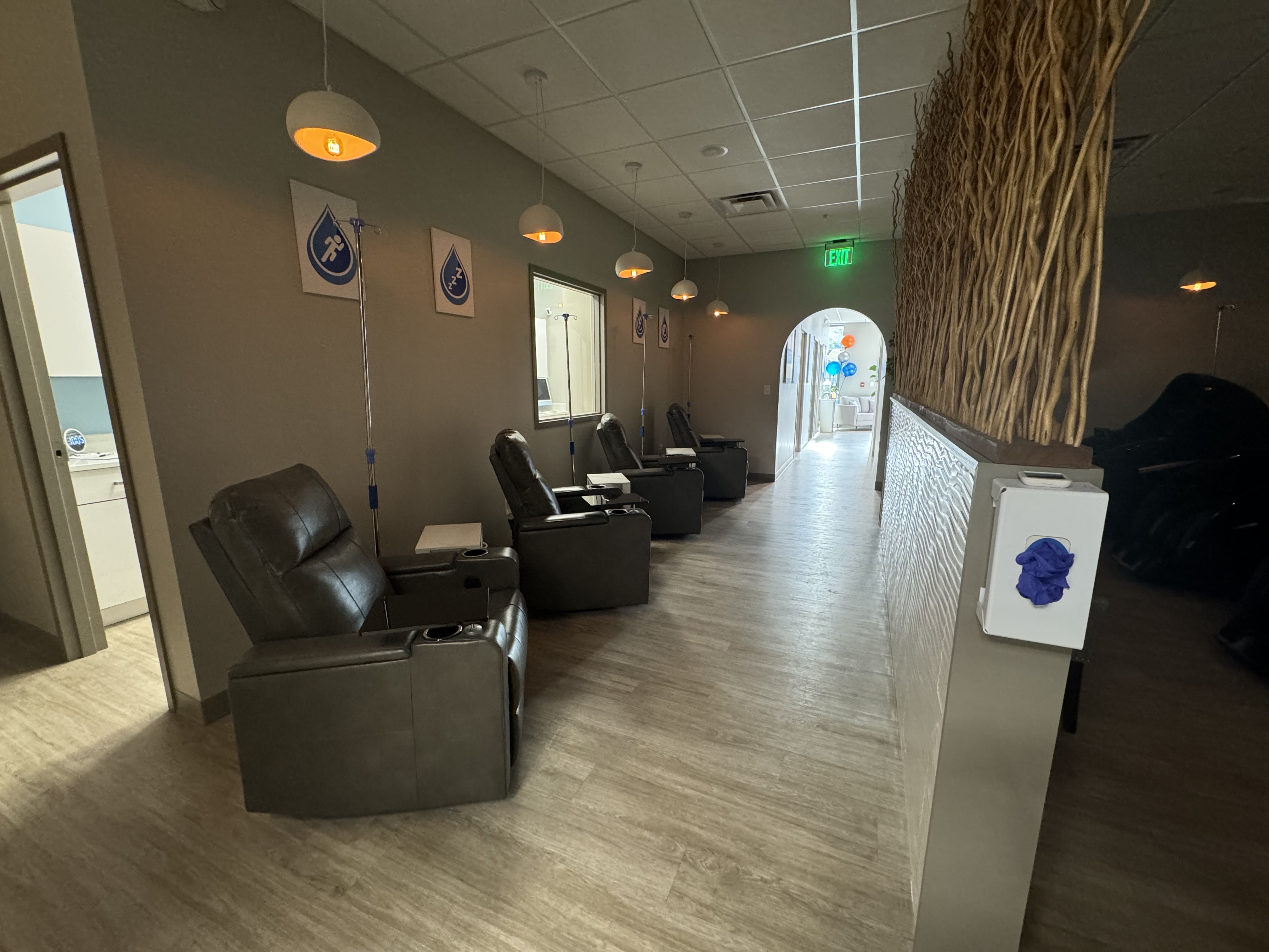 A client relaxing during an IV vitamin drip at Prime IV Hydration Newport, KY